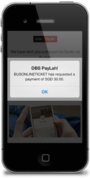 A BusOnlineTicket payment request arriving in DBS PayLah on an early iPhone